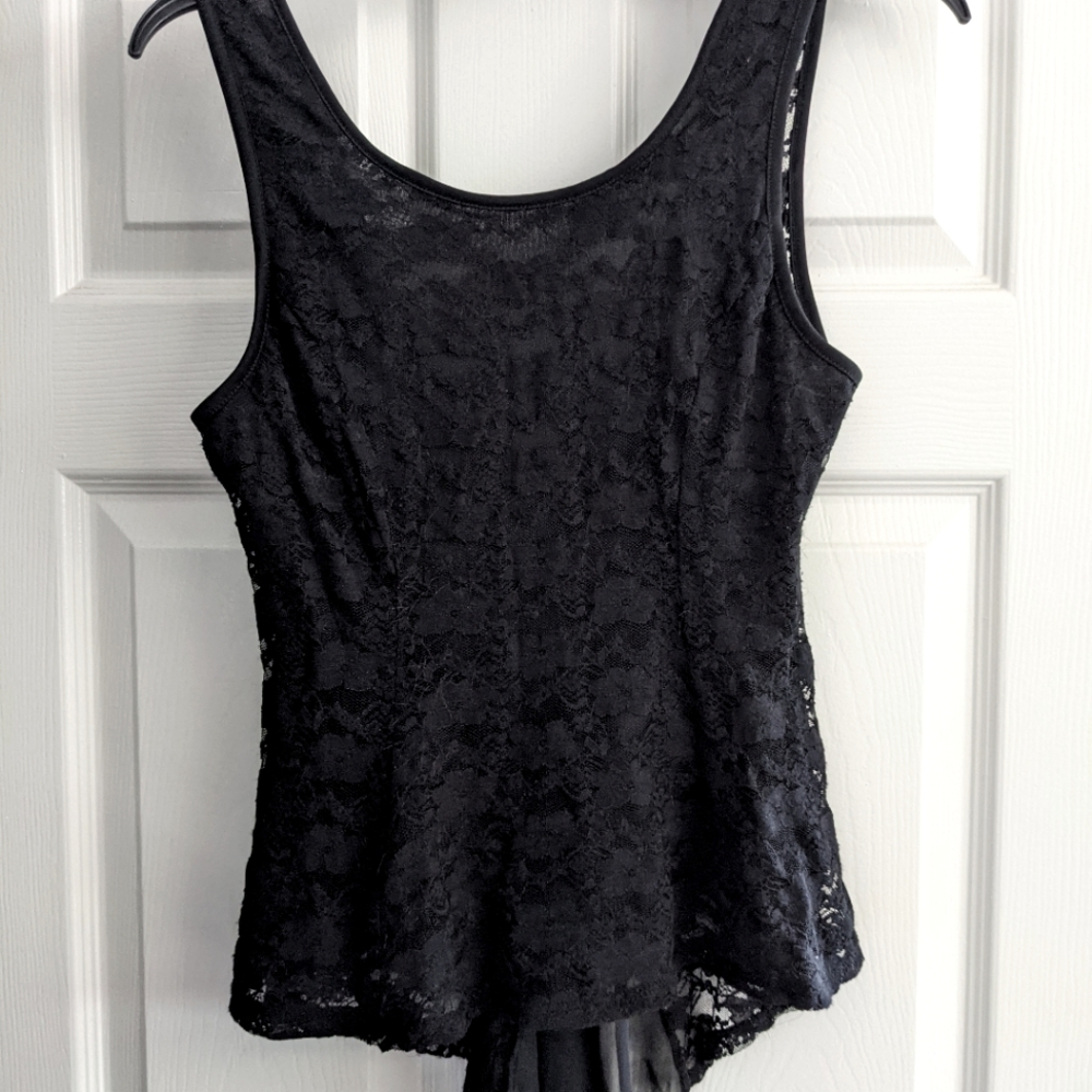 Black women's blouse. Long back with bow.
